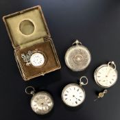Five silver pocket watches.