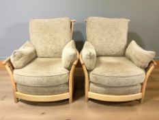 An Ercol elm three piece lounge suite comprising of two seater settee,