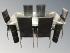 A contemporary black vinyl glass and chrome rectangular dining table, 150 cm x 90 cm x 75 cm,