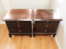 A pair of Stag Minstrel bedside stands, width 53 cm.