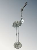 A patinated metal statue of a flamingo, height 78 cm.