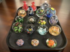 A collection of modern paperweights.