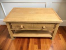 A modern oak two drawer entertainment stand, width 90 cm.