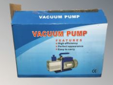 A vacuum pump, in box.
