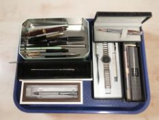A group of fountain and other pens including Parker, a Limit wristwatch and pen set, etc.