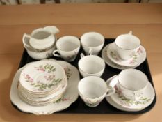Twenty one pieces of Collingwoods floral decorated tea china.