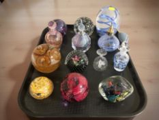 A collection of modern paperweights, Caithness atomiser, etc.
