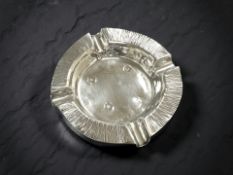 A silver ashtray with bark effect rim, Edinburgh 1973 CONDITION REPORT: 61.4g.