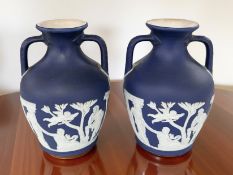 A pair of Wedgwood Jasperware twin-handled Portland vases, height 15.5 cm.