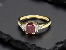 An 18ct gold ruby and diamond ring, in Kutchinsky box, size O CONDITION REPORT: 3.