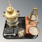 A masthead ship's light, wired for electricity, set of scales,