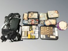 Horology : A large quantity of watchmaker's parts and supplies, including a watch case press,