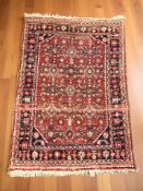 A Hamadan rug, North-West Iran, 160 cm x 107 cm.