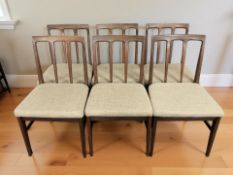 A set of six 20th century teak dining chairs.