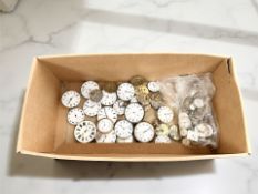 A collection of pocket watches and movements including Parkinson, Frodsham, Movado,