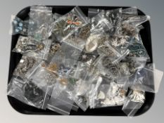 A large quantity of modern costume jewellery, pendants, charm bracelets, necklaces, etc.