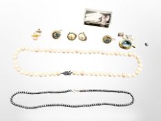 A strand of pearls with 14ct gold clasp,