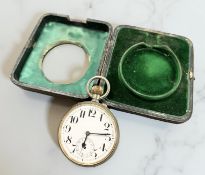 A silver-mounted pocket watch stand containing a Swiss nickel open faced pocket watch with 64mm