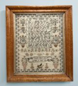 A good quality William IV tapestry sampler dated 1839, 33 cm x 42 cm, in a period burr maple frame.