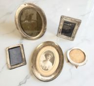 Five antique silver photo frames,