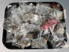 A large quantity of modern costume jewellery, pendants, necklaces, etc.