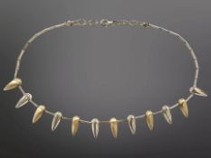 A vintage two-tone silver lozenge necklace,