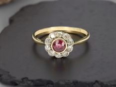 An 18ct yellow gold ruby and diamond ring,
