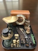 An Art Deco oak mantel clock, a kukri knife in sheath, pepper grinders,