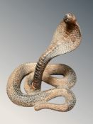 A wooden figure of a king cobra, height 28 cm.