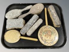 A group of silver mounted dressing table brushes and two petit point dressing table items.