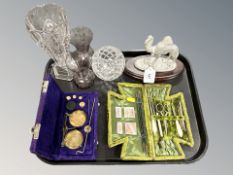 A small set of scales with weights, silvered metal figure of a camel on plinth,