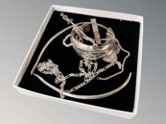 A group of silver and white metal jewellery, necklaces, bangle, tea spoon, etc.