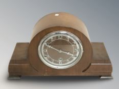 An Art Deco walnut mantel clock, height 22 cm.
