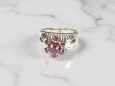 An 18ct gold ruby ring, size P CONDITION REPORT: 4.