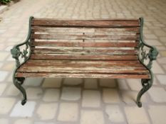 A painted metal framed garden bench,