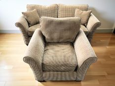 A contemporary three seater settee, length 198 cm, and matching armchair.