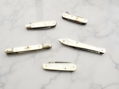 Five mother of pearl-mounted knives