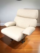 A G Plan Housemaster bent and laminated wood swivel lounge armchair, width 90 cm.