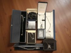 A collection of 925 hallmarked silver necklaces, pendants and chains.