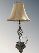 A contemporary patinated metal table lamp, height 76 cm.