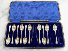 A part-set of silver teaspoons and non-matching tongs, Sheffield marks, in case.