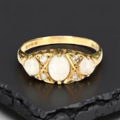 An 18ct gold opal and diamond ring, size L CONDITION REPORT: 2.