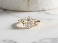 A 9ct gold synthetic stone cluster ring, size P CONDITION REPORT: 2.
