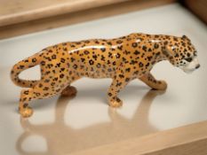 A Beswick leopard, length 31 cm.