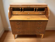 A continental kingwood veneered cyclinder bureau, 90 cm x 47 cm x 97 cm.