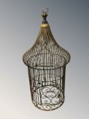 A metal bird cage, height 80 cm.