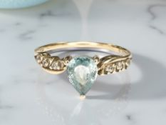 A 9ct gold blue topaz and paste ring, size R CONDITION REPORT: 2.