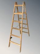 A pine step ladder.