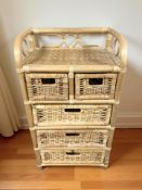 A wicker five drawer chest, height 84 cm.