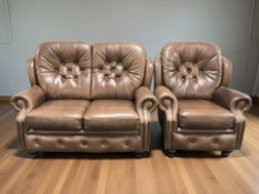 A buttoned brown leather two seater settee,